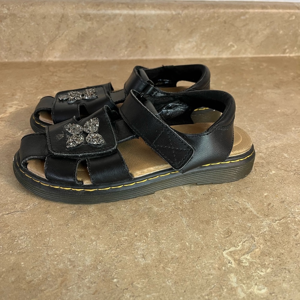 Kids Black Dr.Marten’s Glitter Flower Strap Sandals